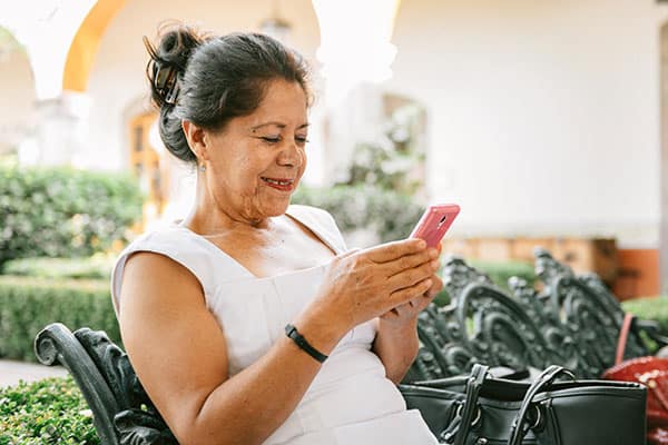 iStock-1155314720_RF Woman playing games on phone