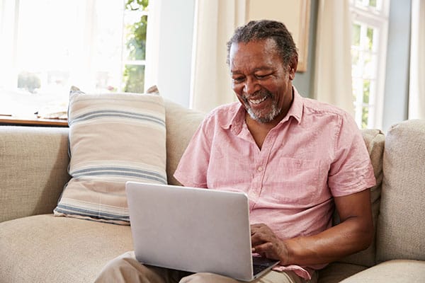iStock-874791754_RF Man on laptop