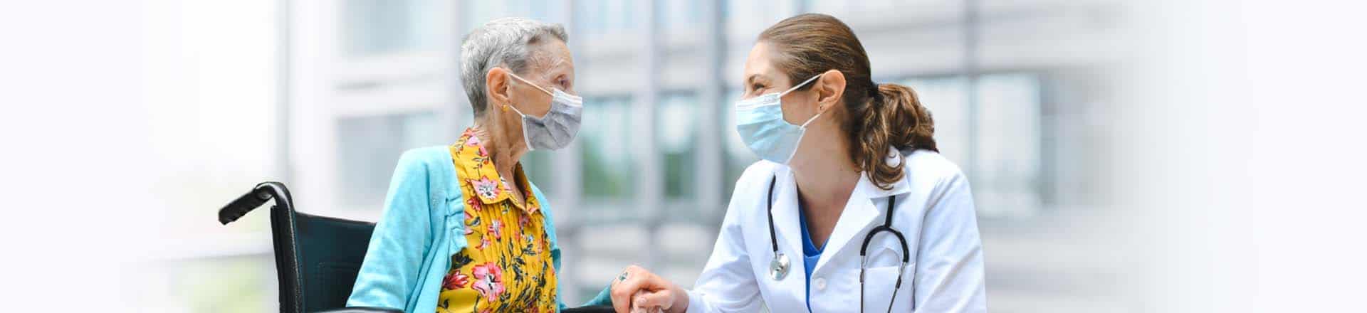 Providers_1920x440 Doctor reassuring patient